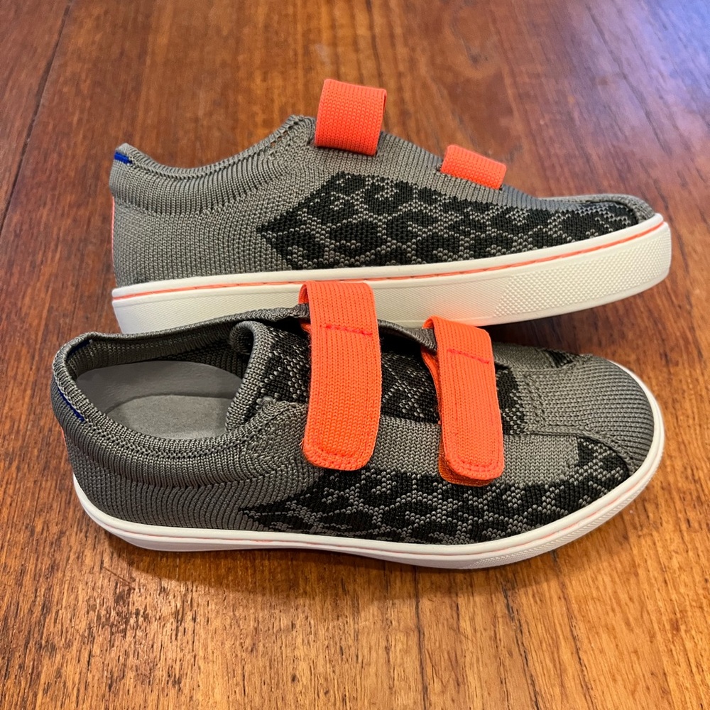 New in box Rothy’s kid sneakers in jungle cat size 12